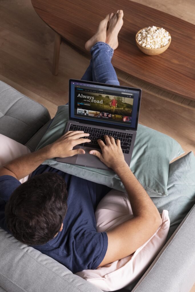 man watching movie on laptop-soappertv