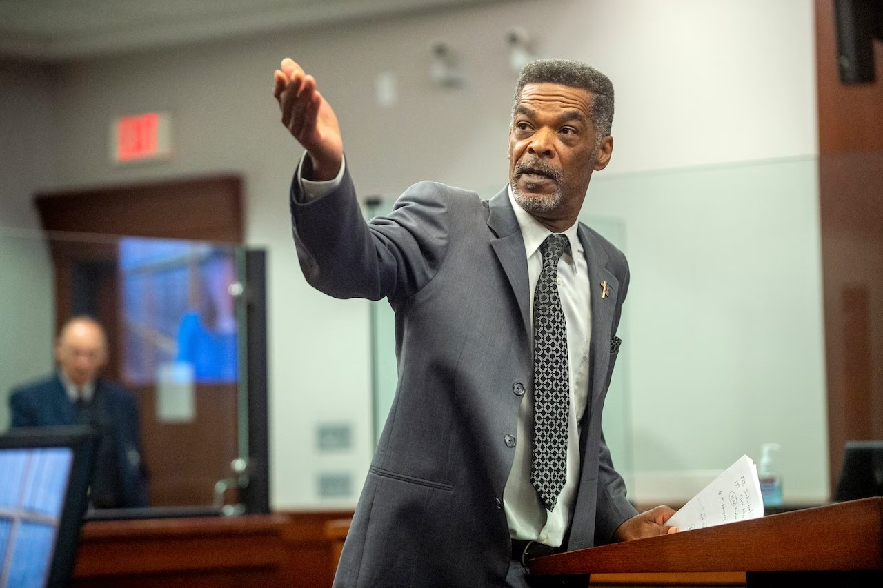 Eric Mays gestures passionately during a council meeting.